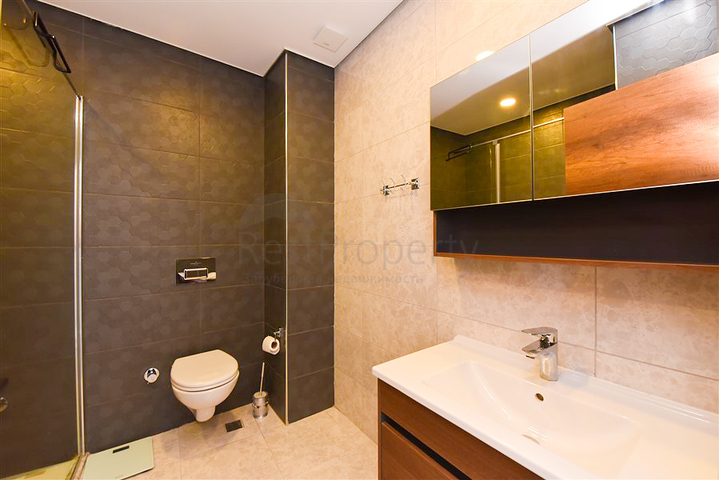 Апартаменты 1+1 в комплексе с отельной инфраструктурой в районе Махмутлар