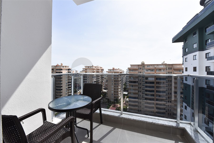 Апартаменты 1+1 в комплексе с отельной инфраструктурой в районе Махмутлар