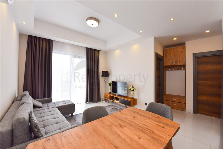 Апартаменты 1+1 в комплексе с отельной инфраструктурой в районе Махмутлар