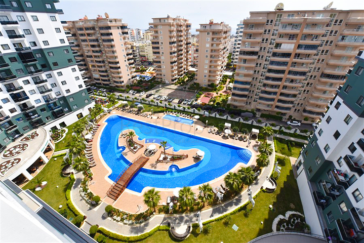 Апартаменты 1+1 в комплексе с отельной инфраструктурой в районе Махмутлар