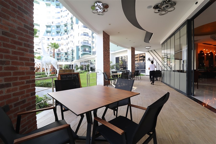 Апартаменты 1+1 в комплексе с отельной инфраструктурой в районе Махмутлар