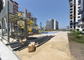 Квартиры 1+1 в новом комплексе отельной концепции в районе Махмутлар