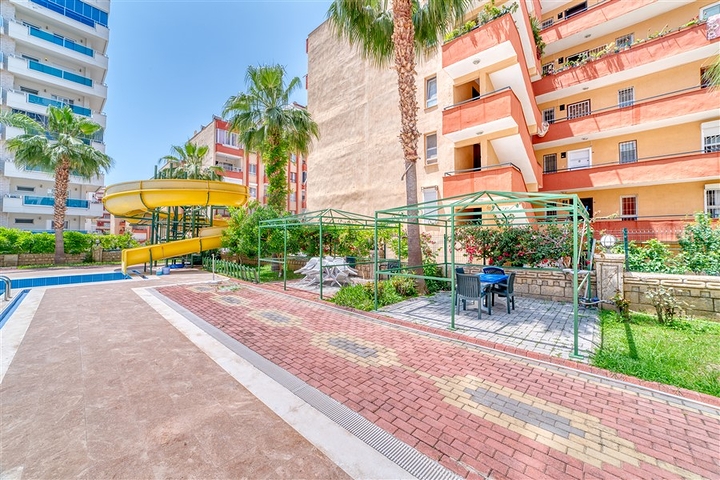 Просторная квартира в районе Махмутлар с видом на море и горы