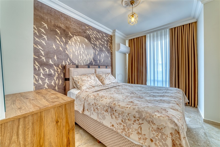 Просторная квартира в районе Махмутлар с видом на море и горы