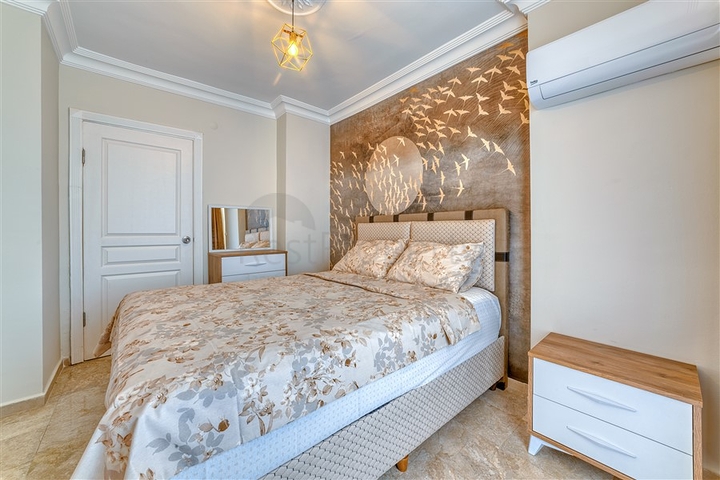 Просторная квартира в районе Махмутлар с видом на море и горы