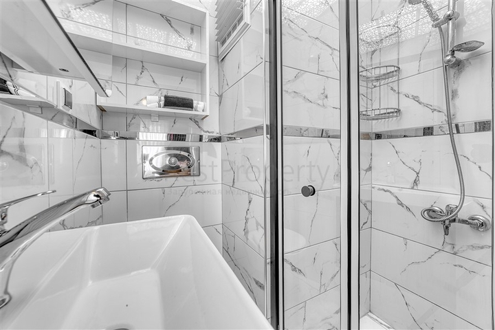 Просторная квартира в районе Махмутлар с видом на море и горы