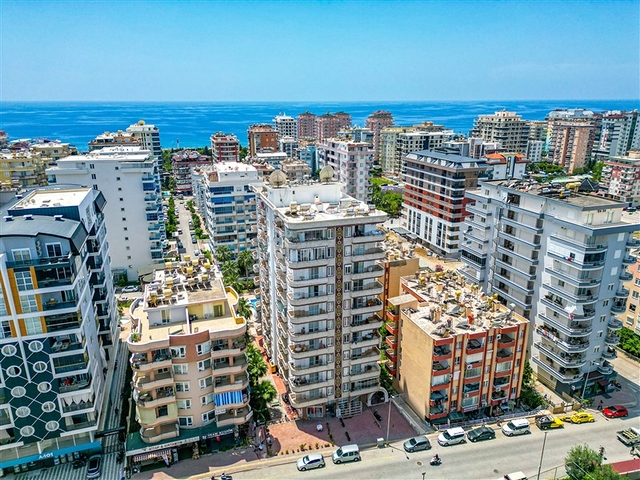 Просторная квартира в районе Махмутлар с видом на море и горы