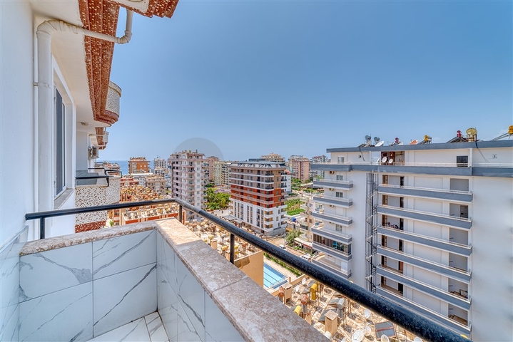 Просторная квартира в районе Махмутлар с видом на море и горы