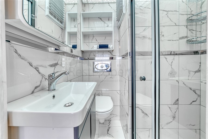 Просторная квартира в районе Махмутлар с видом на море и горы