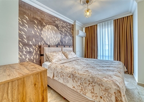 Просторная квартира в районе Махмутлар с видом на море и горы