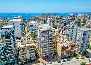 Просторная квартира в районе Махмутлар с видом на море и горы