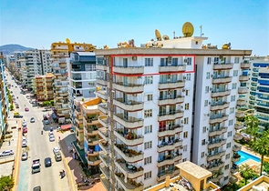 Просторная квартира в районе Махмутлар с видом на море и горы