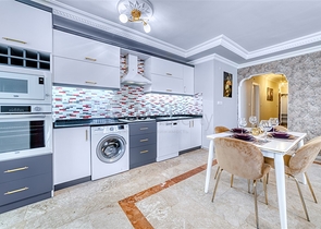 Просторная квартира в районе Махмутлар с видом на море и горы