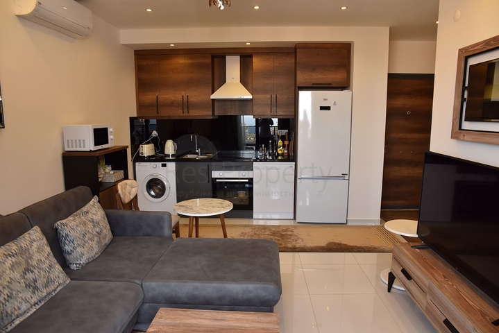 Квартира 1+1 в комплексе с отельной инфраструктурой в районе Махмутлар