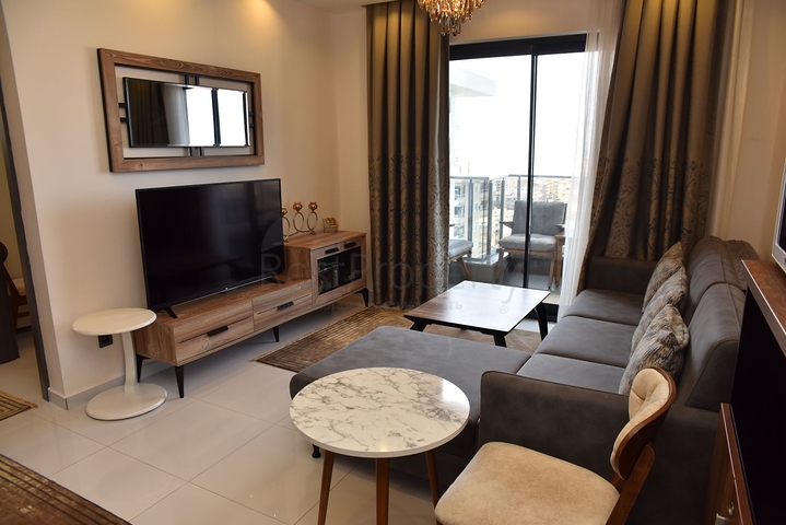 Квартира 1+1 в комплексе с отельной инфраструктурой в районе Махмутлар