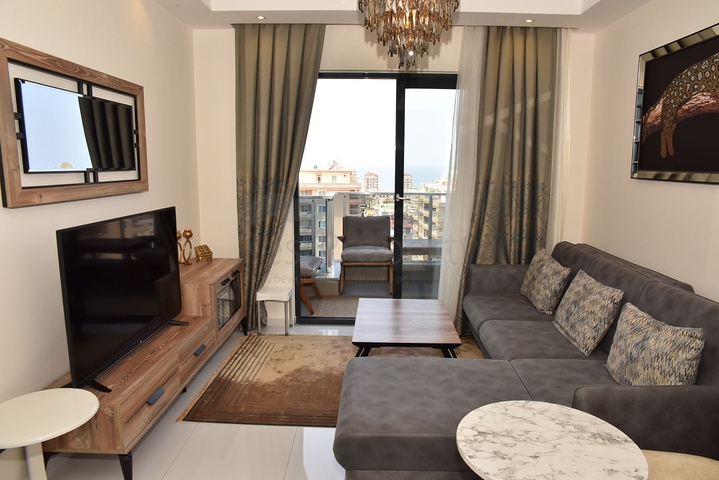 Квартира 1+1 в комплексе с отельной инфраструктурой в районе Махмутлар