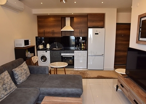 Квартира 1+1 в комплексе с отельной инфраструктурой в районе Махмутлар