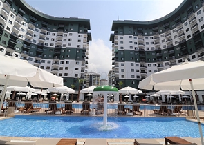 Квартира 1+1 в комплексе с отельной инфраструктурой в районе Махмутлар