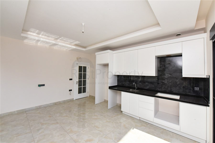 Квартира 2+1 в районе Махмутлар в 400 м от моря 