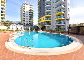 Квартира 1+1 с мебелью и техникой, в районе Махмутлар