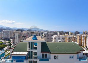 Просторный пентхаус 4+1 с видом на море в районе Махмутлар