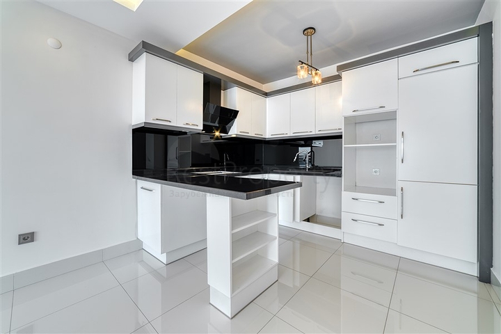 Апартаменты планировкой 3+1 в жилом комплексе отельной концепции в районе Тосмур