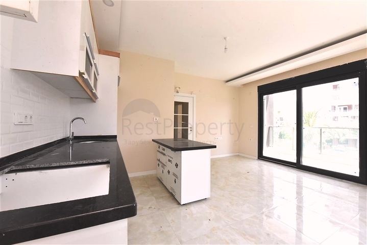 Квартира 1+1 в новом комплексе в районе Тосмур