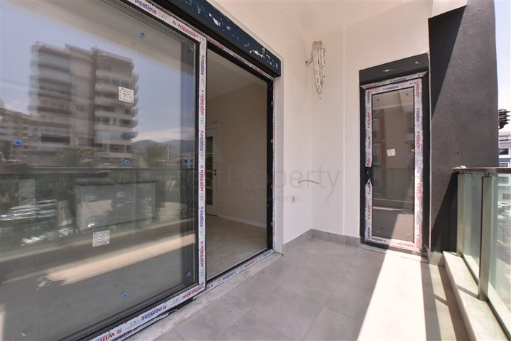 Квартира 1+1 в новом комплексе в районе Тосмур