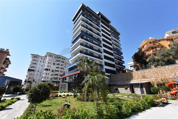 Апартаменты планировкой 2+1 в жилом комплексе в районе Тосмур