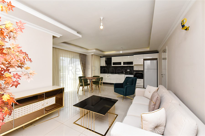 Просторная двухкомнатная квартира в районе Тосмур