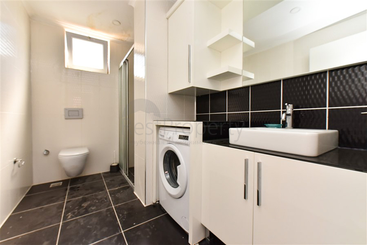 Просторная двухкомнатная квартира в районе Тосмур