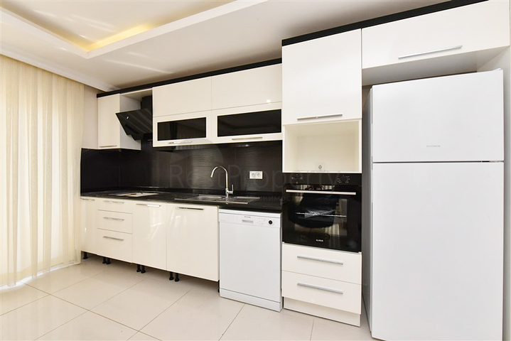 Просторная двухкомнатная квартира в районе Тосмур