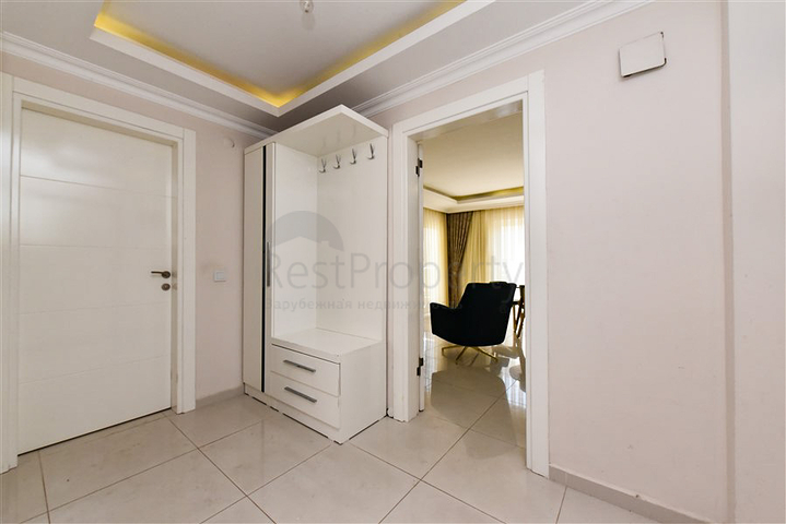 Просторная двухкомнатная квартира в районе Тосмур