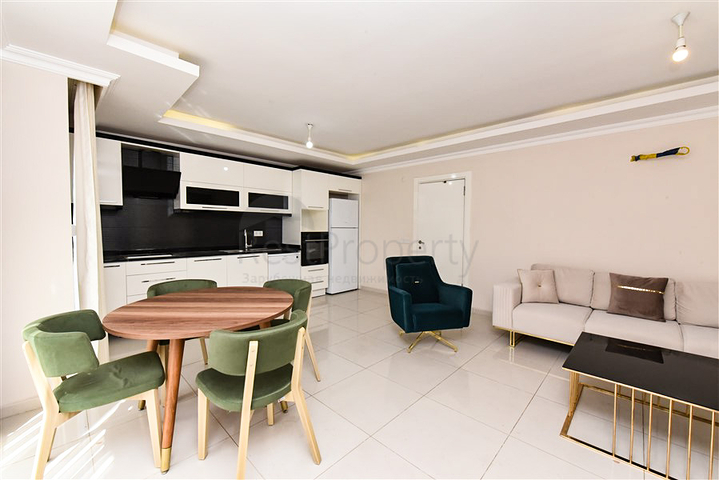 Просторная двухкомнатная квартира в районе Тосмур