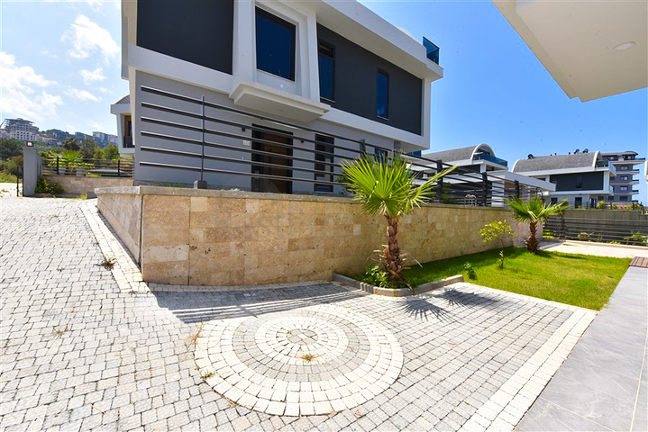 Вилла 4+1 с современным дизайном в живописном районе Каргыджак