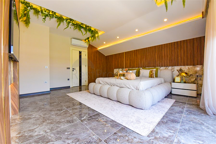 Вилла 4+1 с современным дизайном в живописном районе Каргыджак