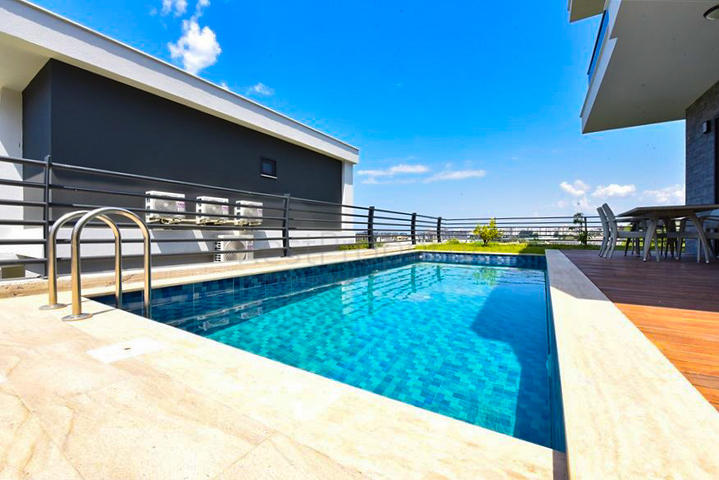 Вилла 4+1 с современным дизайном в живописном районе Каргыджак