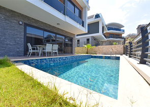 Вилла 4+1 с современным дизайном в живописном районе Каргыджак