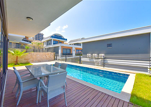 Вилла 4+1 с современным дизайном в живописном районе Каргыджак