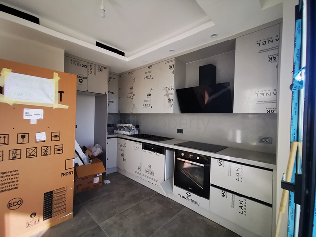 Виллы в живописном районе Туркбюкю, в окружение густой зелени. 