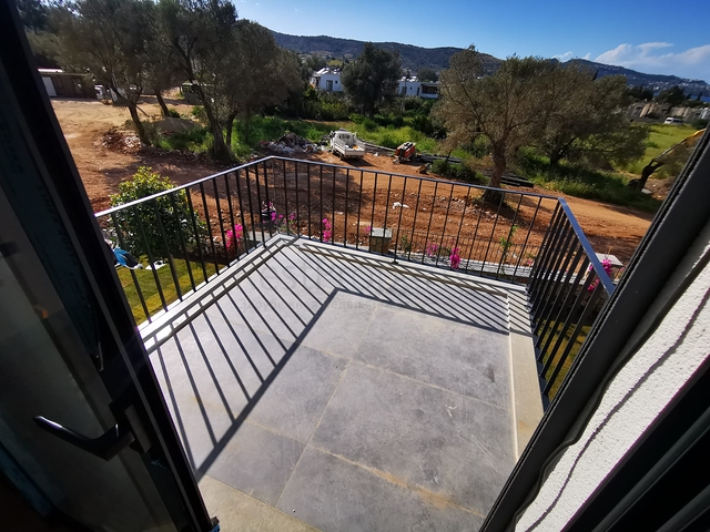 Виллы в живописном районе Туркбюкю, в окружение густой зелени. 