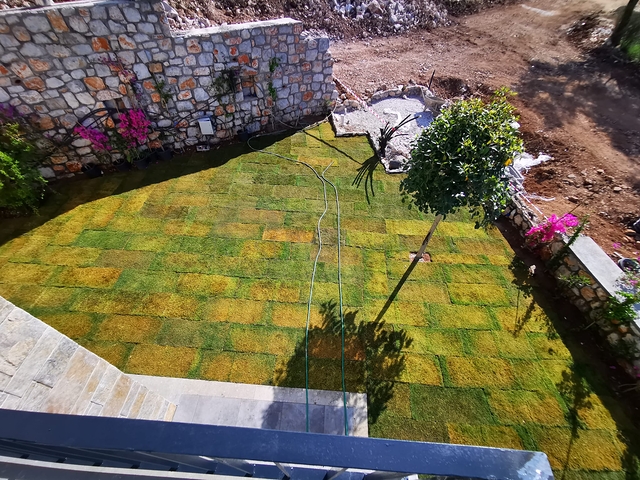 Виллы в живописном районе Туркбюкю, в окружение густой зелени. 