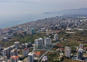 Апартаменты 2+1 в новом комплексе от известного застройщика в Махмутларе.