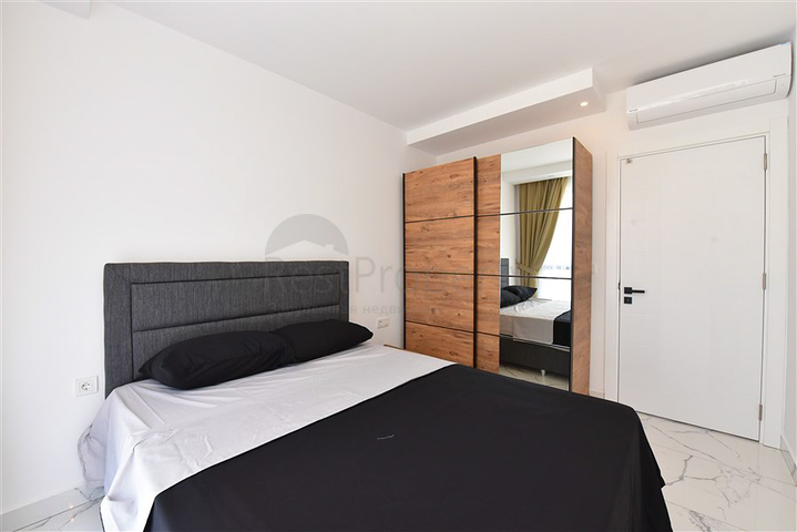 Светлая и уютная квартира 1+1 в районе Махмутлар