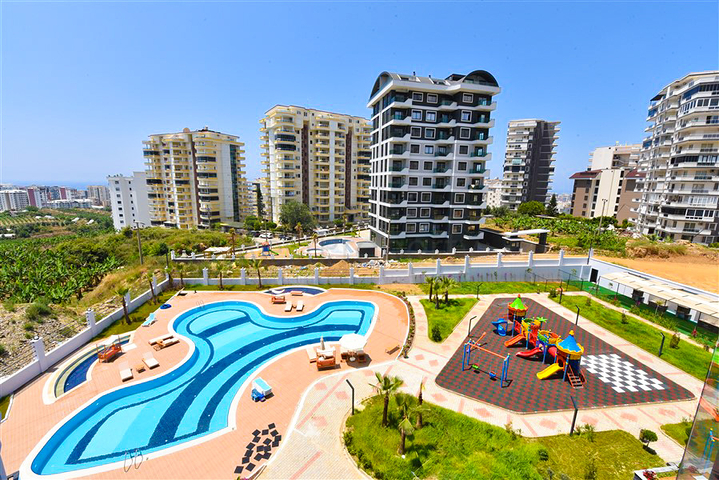 Светлая и уютная квартира 1+1 в районе Махмутлар