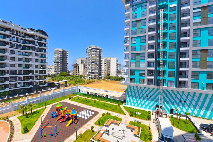 Светлая и уютная квартира 1+1 в районе Махмутлар