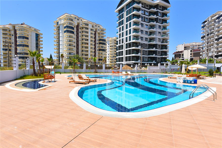 Светлая и уютная квартира 1+1 в районе Махмутлар