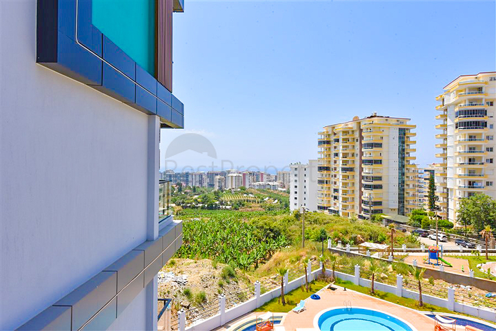 Светлая и уютная квартира 1+1 в районе Махмутлар