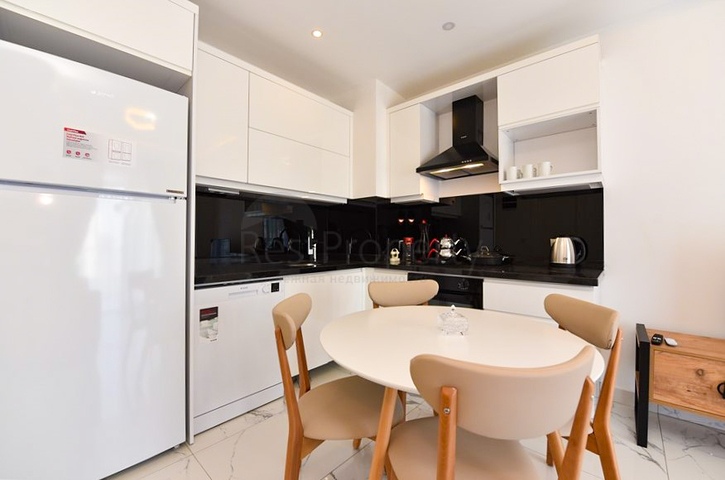 Светлая и уютная квартира 1+1 в районе Махмутлар