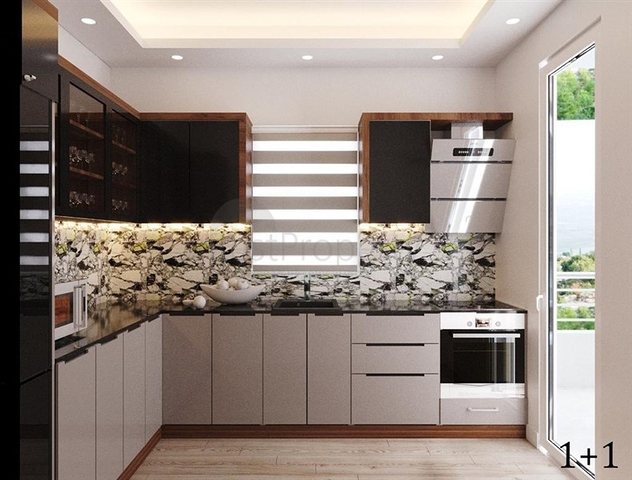 Инвестиционный проект в районе Томюк Эрдемли